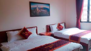 Postel nebo postele na pokoji v ubytování May Hong Hotel