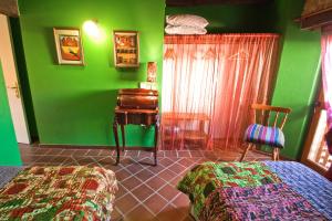 Posteľ alebo postele v izbe v ubytovaní Hotel Rural Casa de Las Campanas