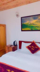Postel nebo postele na pokoji v ubytování May Hong Hotel