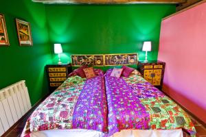 Posteľ alebo postele v izbe v ubytovaní Hotel Rural Casa de Las Campanas