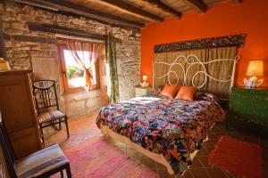 Posteľ alebo postele v izbe v ubytovaní Hotel Rural Casa de Las Campanas