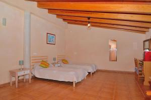 Postel nebo postele na pokoji v ubytování 126 Finca Son Tresco ETV4382 by Mallorca Charme