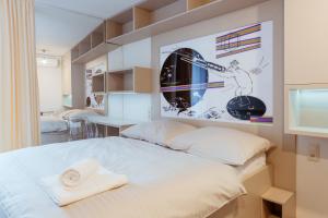 Posteľ alebo postele v izbe v ubytovaní Smarthotel Nezvalova Archa