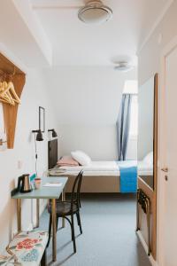 Postel nebo postele na pokoji v ubytování 2Home Hotel Gävle