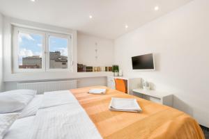Posteľ alebo postele v izbe v ubytovaní Tia Apartments and Rooms
