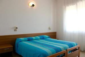 Letto o letti in una camera di Hotel Caravel