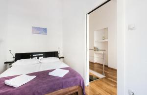 Posteľ alebo postele v izbe v ubytovaní Tia Apartments and Rooms