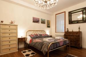 Säng eller sängar i ett rum på Ve-nice Suite Rio Marin SC847