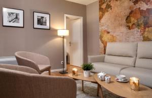 Posezení v ubytování Hôtel des Ducs