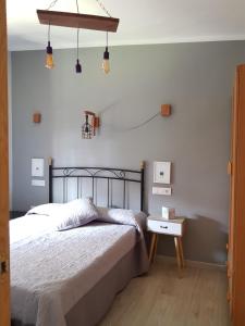 Posteľ alebo postele v izbe v ubytovaní Apartamentos Serendipia