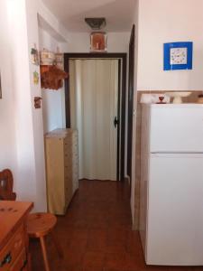 Kuchyň nebo kuchyňský kout v ubytování Appartamenti Bernardo I