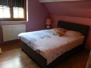 Postel nebo postele na pokoji v ubytování Chambre d'hotes du Tailfer