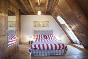 Postel nebo postele na pokoji v ubytování Les Chambres du Château du Rozel