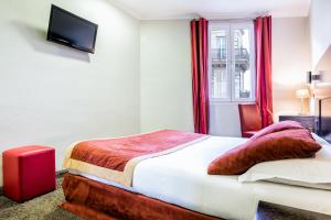 Postel nebo postele na pokoji v ubytování Hotel De Suède