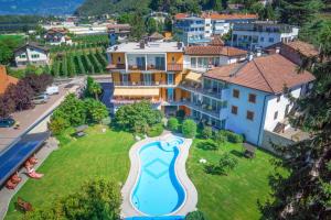 an aerial view of a house with a swimming pool at Hotel Garni Günther in Postal