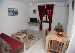 TV a/nebo společenská místnost v ubytování Apartments Phoenix