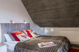 Posteľ alebo postele v izbe v ubytovaní Apartamenty Pod Giewontem