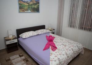 Postel nebo postele na pokoji v ubytování Apartments Phoenix