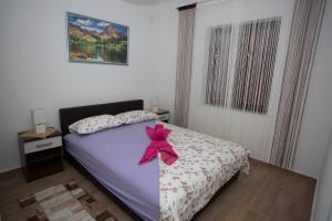 Postel nebo postele na pokoji v ubytování Apartments Phoenix