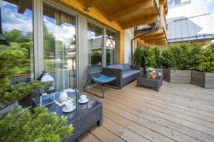 Balkón alebo terasa v ubytovaní Apartamenty Pod Giewontem