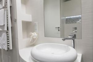 Kúpeľňa v ubytovaní Apartamenty Pod Giewontem