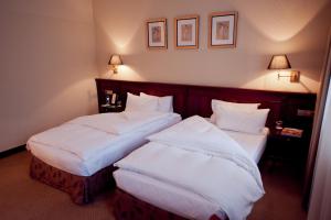 Posteľ alebo postele v izbe v ubytovaní Opera Hotel - The Leading Hotels of the World