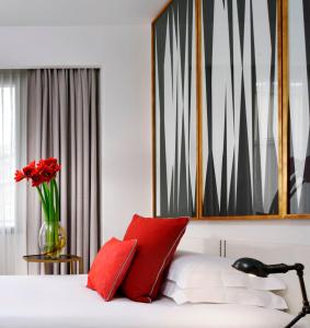 Postel nebo postele na pokoji v ubytování Hotel Pulitzer