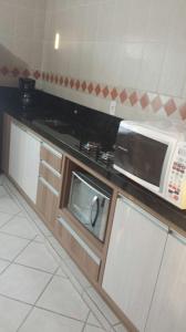 Una cocina o zona de cocina en Apartamento para locação - cód 34