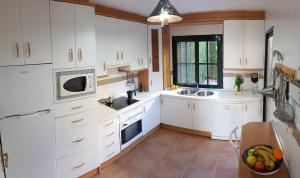 Kuchyňa alebo kuchynka v ubytovaní Casa En Primera Linea De Playa