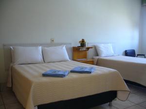 Postel nebo postele na pokoji v ubytování Residence Hotel