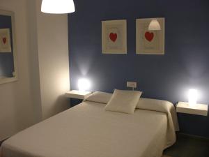 Cama o camas de una habitación en Playa y Montaña Faura-Valencia