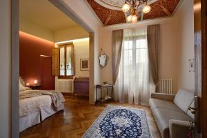 Posteľ alebo postele v izbe v ubytovaní Villa Le Facezie B&B