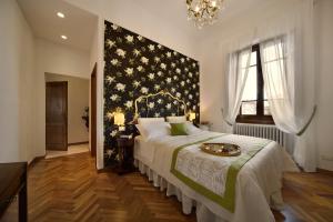 Posteľ alebo postele v izbe v ubytovaní Villa Le Facezie B&B