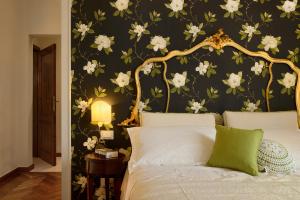 Posteľ alebo postele v izbe v ubytovaní Villa Le Facezie B&B