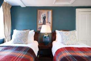 Ένα ή περισσότερα κρεβάτια σε δωμάτιο στο Luxury Regency Apartment in Bath City Centre