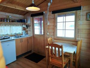 Кухня или кухненски бокс в Stora Sandfell Rooms and Cottages