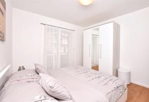 Ένα ή περισσότερα κρεβάτια σε δωμάτιο στο Apartment Dora
