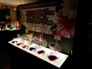 a display of desserts in bowls on a table at HOTEL VERSYS (Adult Only) in Hiroshima