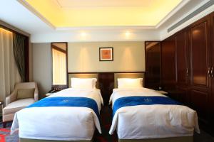 Katil atau katil-katil dalam bilik di Xi'an Lanxi International Hotel