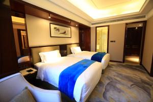 Katil atau katil-katil dalam bilik di Xi'an Lanxi International Hotel