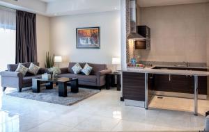 Posezení v ubytování Loumage S Suites and Spa