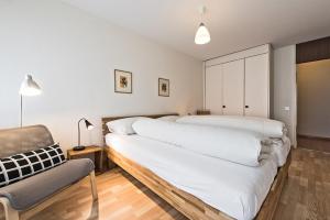 Postel nebo postele na pokoji v ubytování Appartementhaus-Quadern