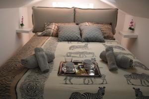 Ліжко або ліжка в номері Apartment Prima