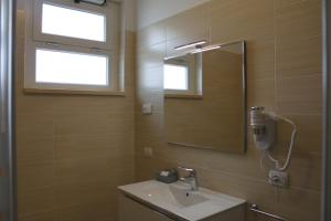 Koupelna v ubytování Residenza Somma + 26 fotografií
