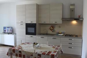 Kuchyň nebo kuchyňský kout v ubytování Residenza Somma