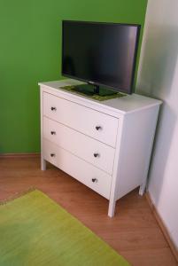 フォンタナ ピッツェリア - ペンションにあるテレビまたはエンターテインメントセンター