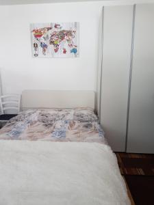 Una cama o camas en una habitación de Nigritella