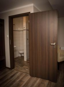 Koupelna v ubytování Apartamentowiec Kuźniar + 18 fotografií