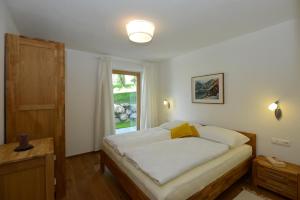 Posteľ alebo postele v izbe v ubytovaní Apartments Angela