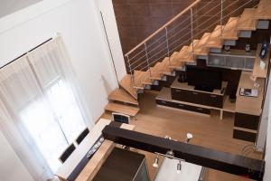 a view of a staircase in a house at Apartamento Quixote Loft Almagro in Almagro